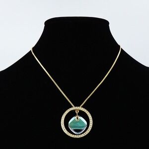 SWAROVSKI Etoile Necklace Gold Tone Pave Rhinestone Iridescent Pendant Celestial